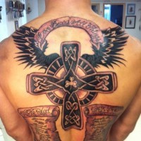 Celtic style winged cross and inscriptions tattoo on back