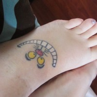 Tatuaje en el pie, sonrisa del gato de cheshire