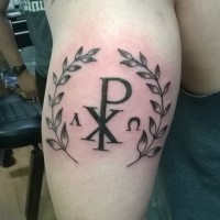 Chi Rho special Christ monogram in Laurel wreath tattoo on forearm religiously themed
