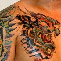 Chinese foo dog tattoo on shoulder