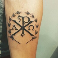Christ monogram Chi Rho forearm tattoo with Laurel wreath