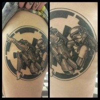 Circle shaped black ink thigh tattoo of sexy storm trooper woman