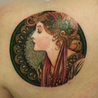 Circle shaped vintage painting like colored shoulder tattoo of woman