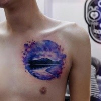 Circle shaped watercolor chest tattoo of big lake near high mountains