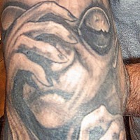 Classic gray alien tattoo