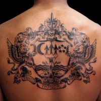 Coat of arms tattoo on upper back tattoo