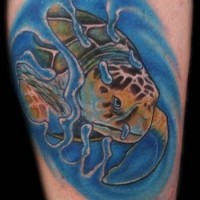 Colorful floating sea turtle tattoo