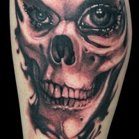 Black female skull tattoo with eyes