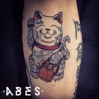 Colored amazing looking leg tattoo of funny maneki neko japanese lucky cat with broken skate