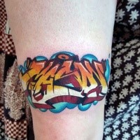 Colored arm tattoo of small graffiti lettering