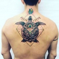 Colored awesome looking colored upper back tattoo of big turtle with ornaments