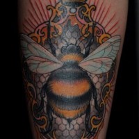Colored bee  with crown tattoo on leg