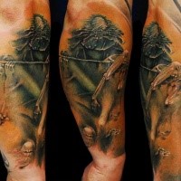 Colored creepy looking arm tattoo of creepy monster