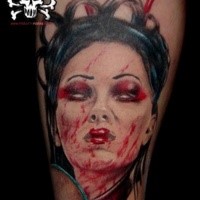 Colored creepy looking demonic geisha portrait tattoo