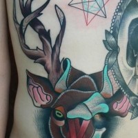 Colored deer head tattoo on ribs
