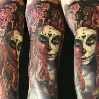 Colored detailed arm tattoo of mystical woman with flowers