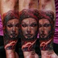 Colored evil looking arm tattoo of alien woman with flame