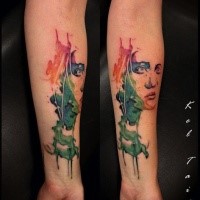 Colored forearm tattoo of abstract style woman portrait