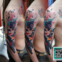 Colored geometrical style shoulder tattoo