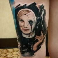 Colored horror style arm tattoo of demonic mother