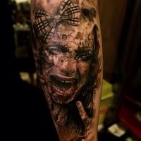Colored horror style creepy looking corrupted bow tattoo