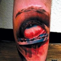 Colored horror style creepy looking leg tattoo of eye with razor