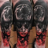 Colored horror style creepy looking leg tattoo of demonic woman with skull