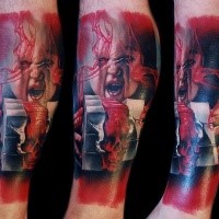 Colored horror style creepy looking leg tattoo fo bloody monster face