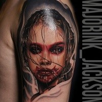 Colored horror style creepy looking shoulder tattoo of bloody woman face