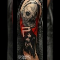 Colored horror style creepy looking shoulder tattoo of evil monster