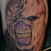 Colored horror style demonic biceps tattoo of Resident Evil monster