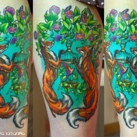 Colored illustrative style foxes tattoo on thigh with bird cage and flowers
