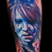 Colored illustrative style hand tattoo of fantasy woman face