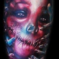 Colored illustrative style monster face tattoo