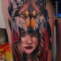 Colored illustrative style thigh tattoo of woman with wolf helmet