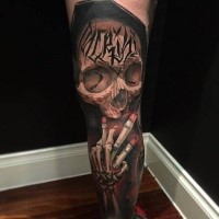 Colored impressive looking leg tattoo of skeleton with lettering
