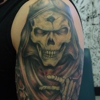 Colored interesting looking illustrative style shoulder tattoo of creepy Grimm reaper