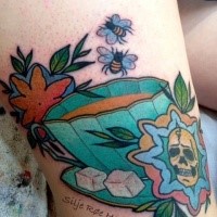Colored medium size leg tattoo of tea cup with bees and flowers