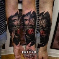 Colored mystical looking forearm tattoo of fantasy woman with gas mask