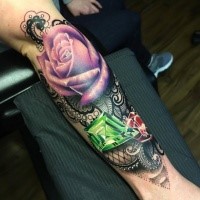Colored new school style forearm tattoo of violet rose with diamonds