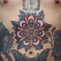 Colored old school style large flower tattoo on belly