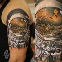 Colored shoulder tattoo of astronaut suit