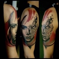 Colored shoulder tattoo of woman face with owl eye