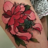 Colored thigh tattoo of big flower on arm