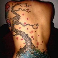 Colored tree tattoo on back