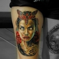 Colored very detailed thigh tattoo of bloody woman with butterfly