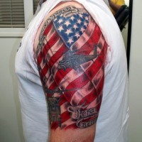 Colorful american air force symbol tattoo on shoulder