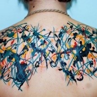 Colorful and creative upper back tattoo of strange ornaments