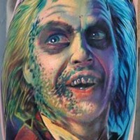 Colorful beetlejuice horror tattoo by Paul Acker