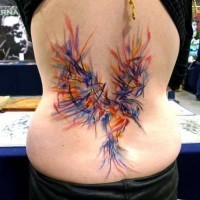 Colorful bird tattoo on back